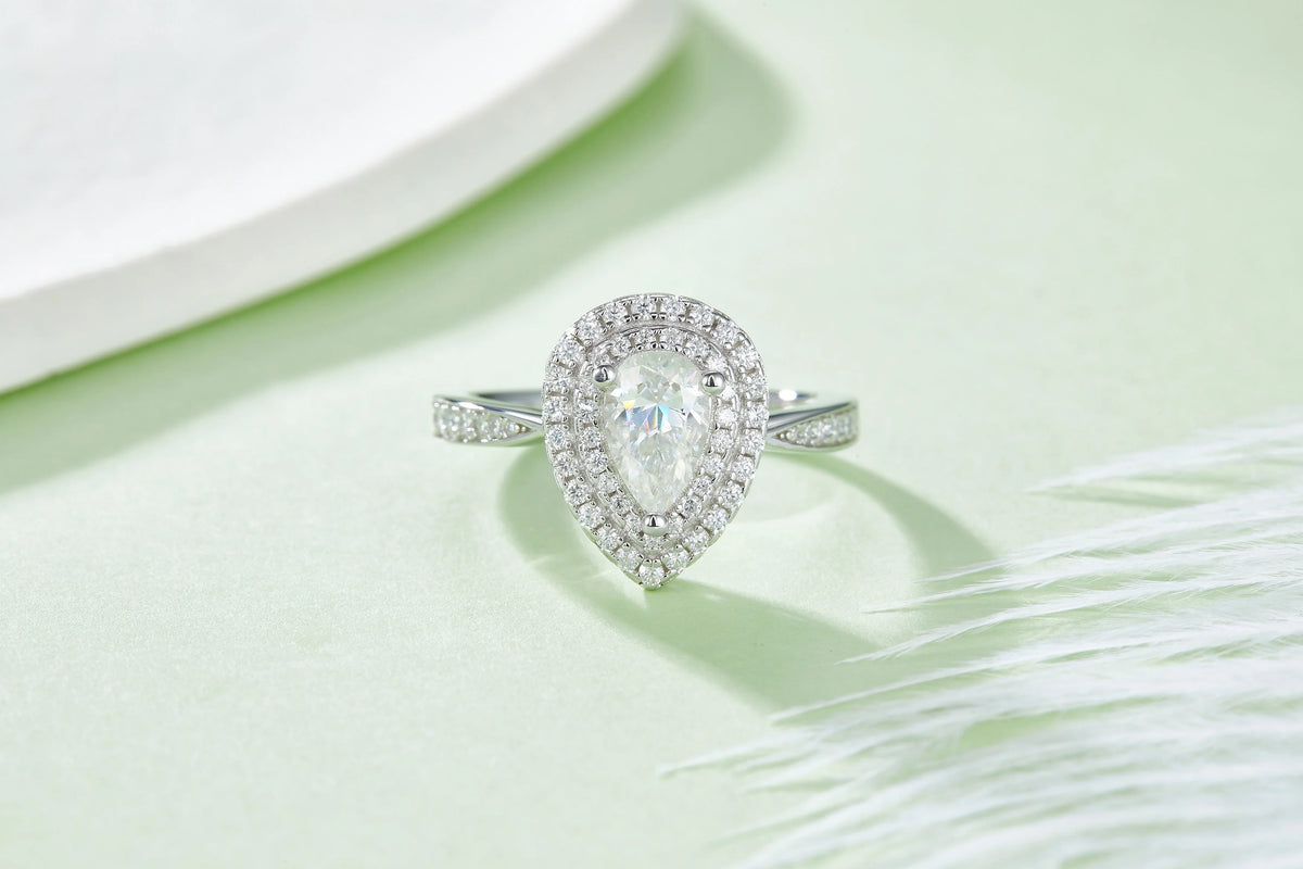 Pear Cut Moissanite Pave Set Engagement Ring In 18K White Gold Plating Over Silver V855039