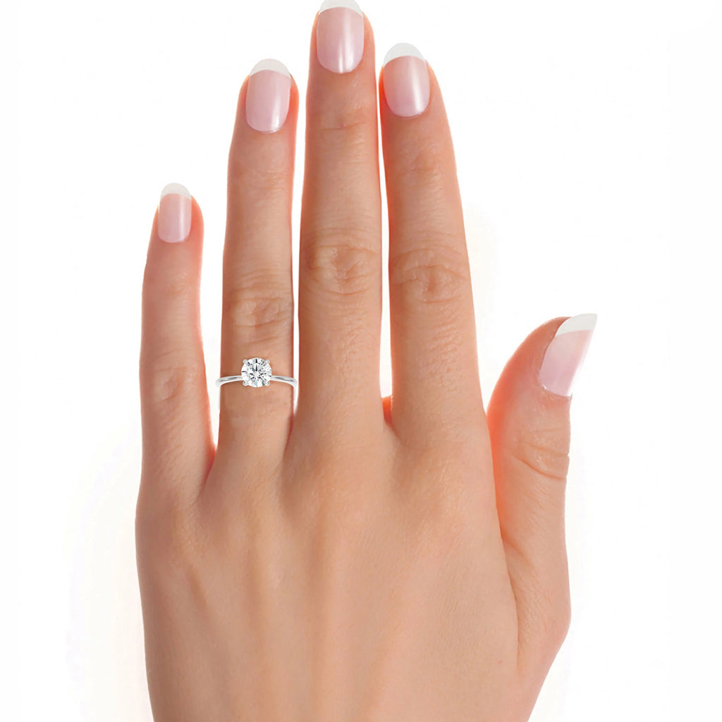 14k White Gold Solitaire Engagement Ring Q692831